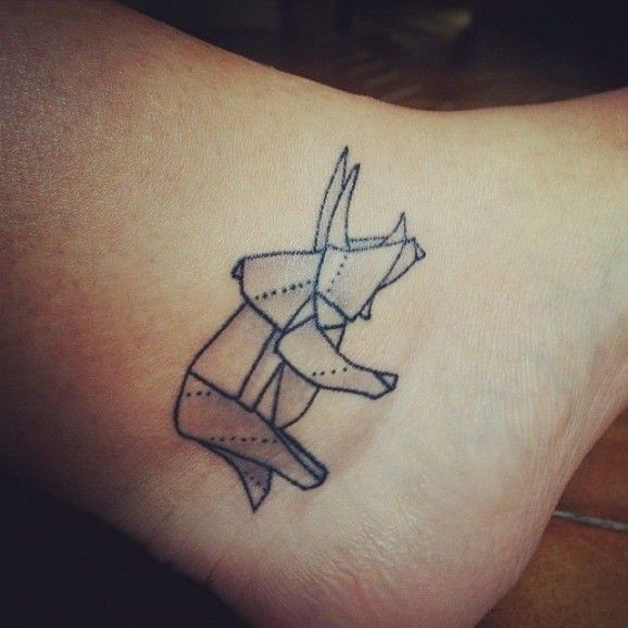 black geometric rhino tattoo on leg tattooimages biz black geometric rhino tattoo on leg tattooimages biz
